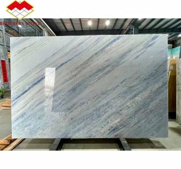 Upgrade Your Living Staircase Hall with 20mm Blue Ice Onyx Stone Veneer and Backlight
